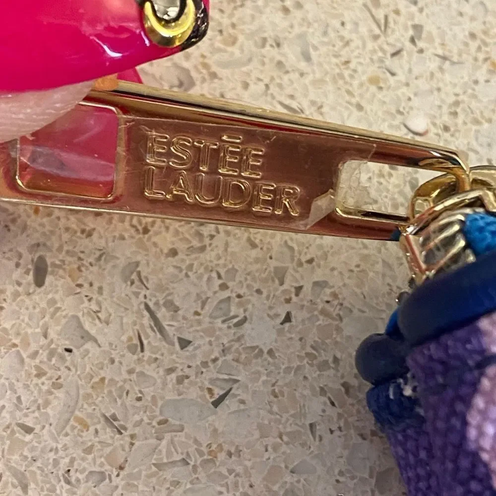 Two Estée Lauder NWOT make up bags
